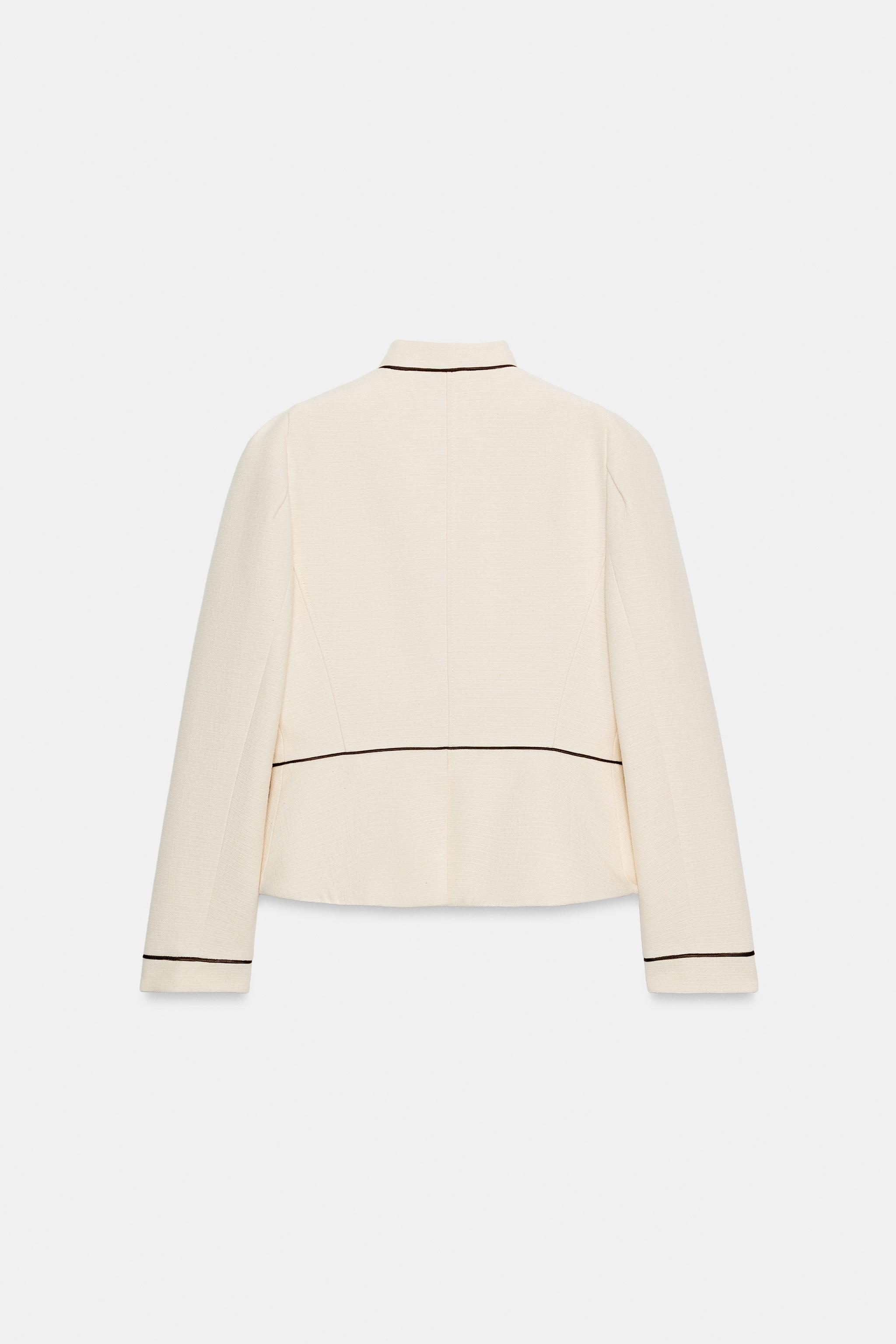 VESTE AJUSTÉE À LISERÉS EN CONTRASTE